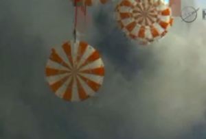 Orion capsule parachutes deployed.