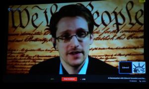 What's wrong with this picture? Snowden beamed into SXSW conference to talk about freedom.